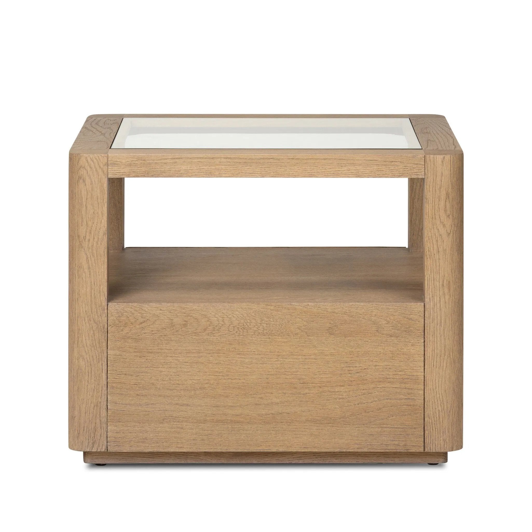 Bring bonus storage and a light look to the living space. Made from sandy oak and clear tempered glass with a single drawer, shelving beneath the glass doubles as a shadowbox or an extra display surface.As lovers of clean materials at Amethyst, we love the designer inspired Shiloh End Table - Tempered Glass. Amethyst Home provides interior design, new home construction design consulting, vintage area rugs, and lighting in the Washington metro area.