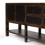 Featuring Shizuko Distressed Walnut Sideboard by Four Hands at Amethyst Home. This Shizuko Distressed Walnut Sideboard is perfect for adding extra storage and style to your dining or living room. With its unique distressed walnut finish, it will add a touch of elegance to any space. Its spacious interior and sturdy build make it a functional and durable choice. Amethyst Home provides interior design, new home construction design consulting, vintage area rugs, and lighting in the Dallas metro area.