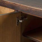 Featuring Shizuko Distressed Walnut Sideboard by Four Hands at Amethyst Home. This Shizuko Distressed Walnut Sideboard is perfect for adding extra storage and style to your dining or living room. With its unique distressed walnut finish, it will add a touch of elegance to any space. Its spacious interior and sturdy build make it a functional and durable choice.. Amethyst Home provides interior design, new home construction design consulting, vintage area rugs, and lighting in the Miami metro area.