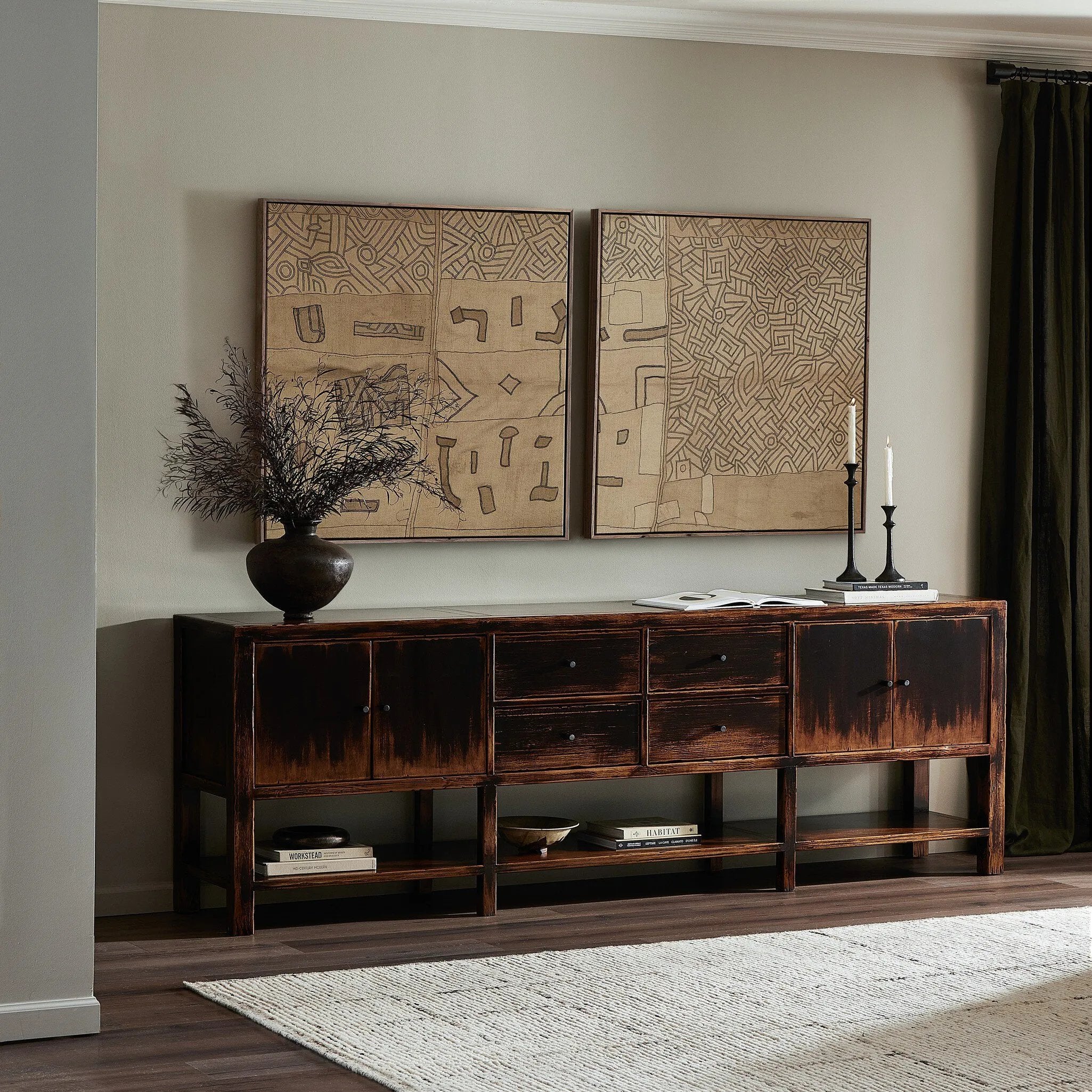 Featuring Shizuko Distressed Walnut Sideboard by Four Hands at Amethyst Home. This Shizuko Distressed Walnut Sideboard is perfect for adding extra storage and style to your dining or living room. With its unique distressed walnut finish, it will add a touch of elegance to any space. Its spacious interior and sturdy build make it a functional and durable choice.. Amethyst Home provides interior design, new home construction design consulting, vintage area rugs, and lighting in the Tampa metro area.