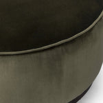 Featuring Sinclair Surrey Olive Large Round Ottoman by Four Hands at Amethyst Home. Upholstered in a deep olive velvet and paired with a  rich brown base, this wide, round ottoman can be placed just about anywhere – bringing with it a luxe vibe. Style with a tray as a design-forward coffee table.Overall Dimensions: 36.00"w x 36.00"d x 14.50"hWeight : 26.46 lbs. Amethyst Home provides interior design, new home construction design consulting, vintage area rugs, and lighting in the Austin metro area.