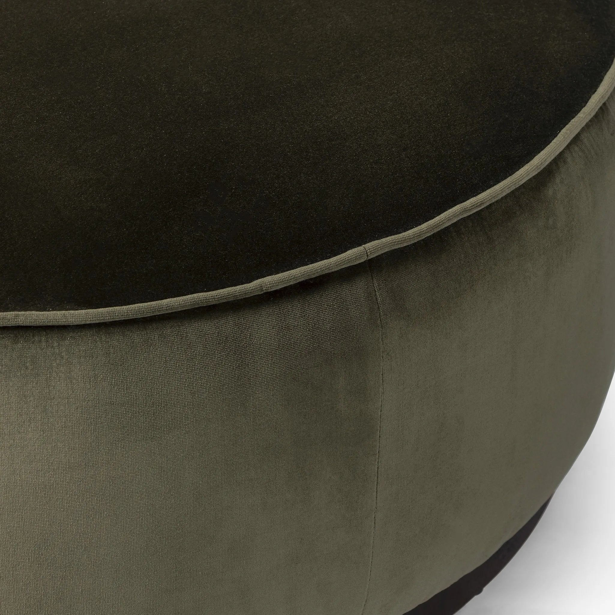 Featuring Sinclair Surrey Olive Large Round Ottoman by Four Hands at Amethyst Home. Upholstered in a deep olive velvet and paired with a  rich brown base, this wide, round ottoman can be placed just about anywhere – bringing with it a luxe vibe. Style with a tray as a design-forward coffee table.Overall Dimensions: 36.00"w x 36.00"d x 14.50"hWeight : 26.46 lbs. Amethyst Home provides interior design, new home construction design consulting, vintage area rugs, and lighting in the Austin metro area.