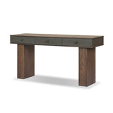 Warm, timeless woods pair with painted linen drawers fronts lacquered in a dark green, for a updated bohemian look. Complete with three drawers for media needs and more.As enthusiasts of modern style at Amethyst, we love the optimistic inspired Soloman Console Table - Stained Saddle Brown Sungkai Veneer. Amethyst Home provides interior design, new home construction design consulting, vintage area rugs, and lighting in the Boston metro area.