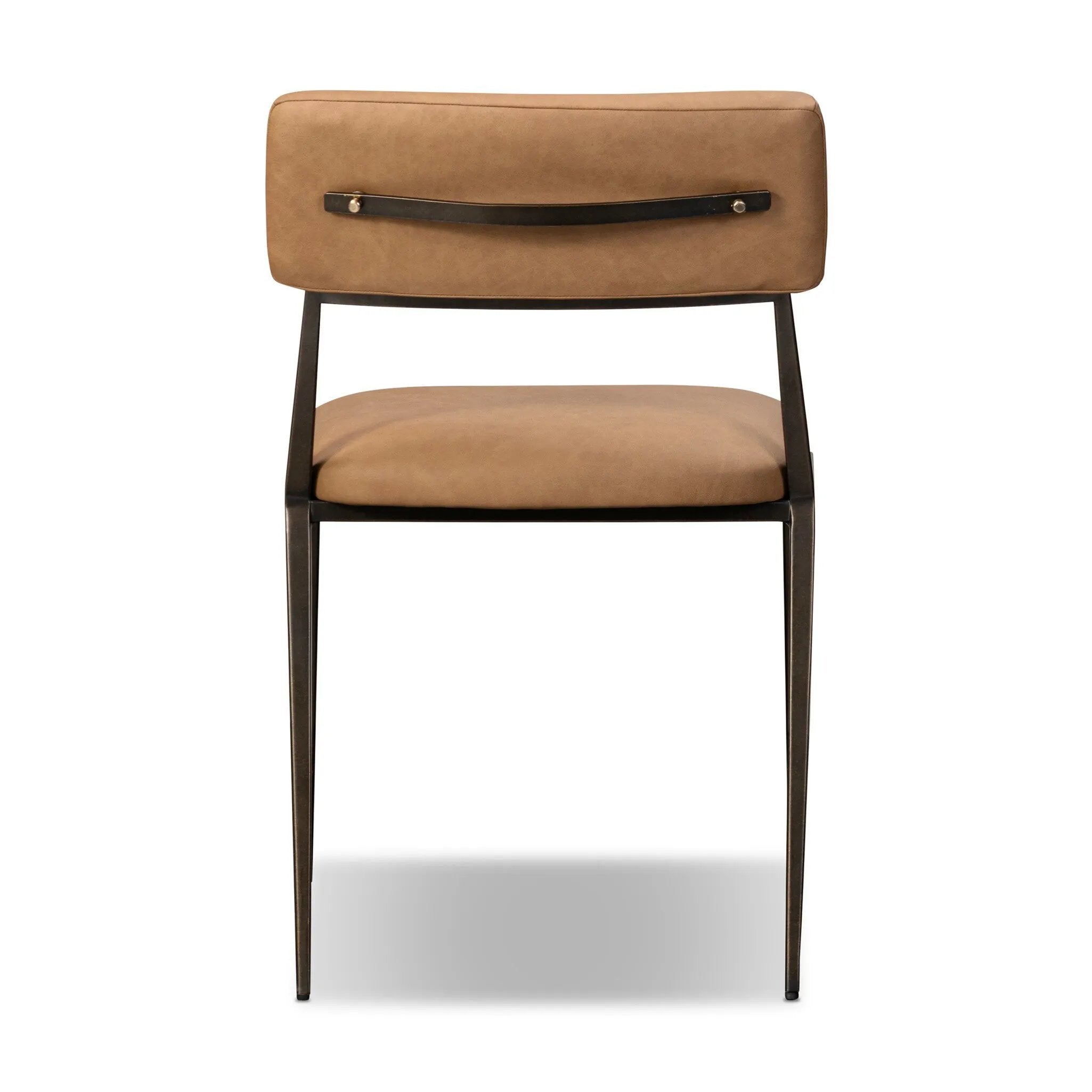 Bring a slim, light look to the dining room. This dining chair pairs camel top-grain leather and bronzed iron to craft a simple, airy look. A tapered leg and decorative handle on the back elevate the look.As enthusiasts of natural materials at Amethyst, we love the warm modern inspired Somerson Dining Chair - Maestro Camel. Amethyst Home provides interior design, new home construction design consulting, vintage area rugs, and lighting in the Kansas City metro area.