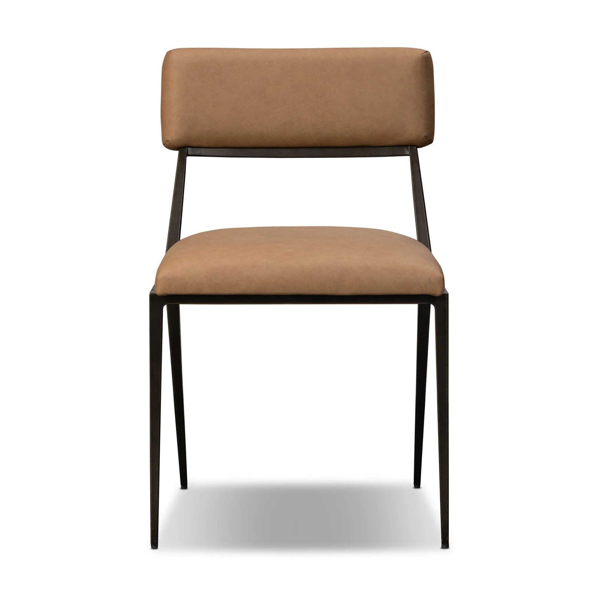 Bring a slim, light look to the dining room. This dining chair pairs camel top-grain leather and bronzed iron to craft a simple, airy look. A tapered leg and decorative handle on the back elevate the look.As enthusiasts of natural materials at Amethyst, we love the warm modern inspired Somerson Dining Chair - Maestro Camel. Amethyst Home provides interior design, new home construction design consulting, vintage area rugs, and lighting in the Washington metro area.