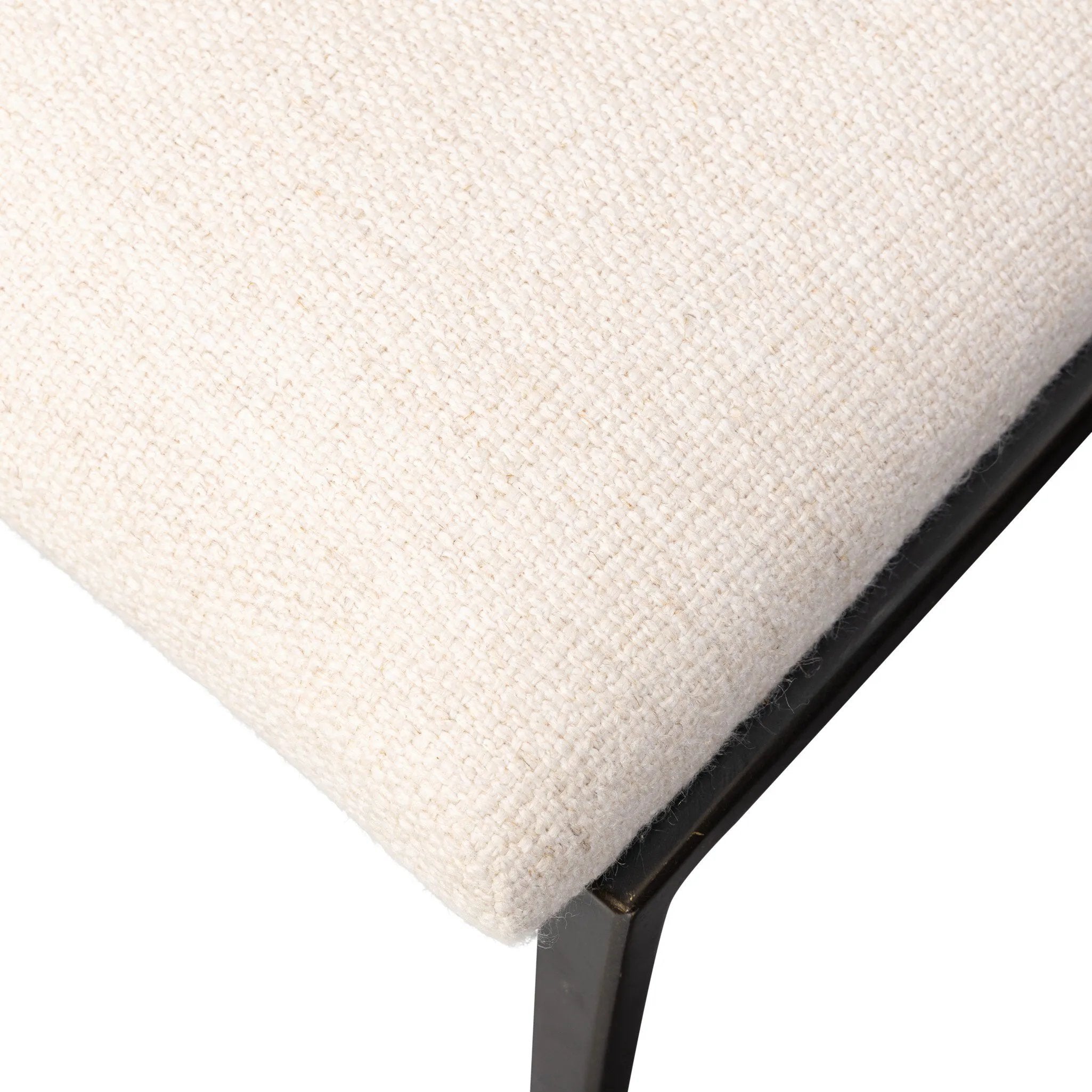 Bring a slim, light look to the dining room. This dining chair pairs cream performance fabric exclusive to Four Hands and bronzed iron to craft a simple, airy look. A tapered leg and decorative handle on the back elevate the look. Amethyst Home provides interior design, new home construction design consulting, vintage area rugs, and lighting in the Park City metro area.