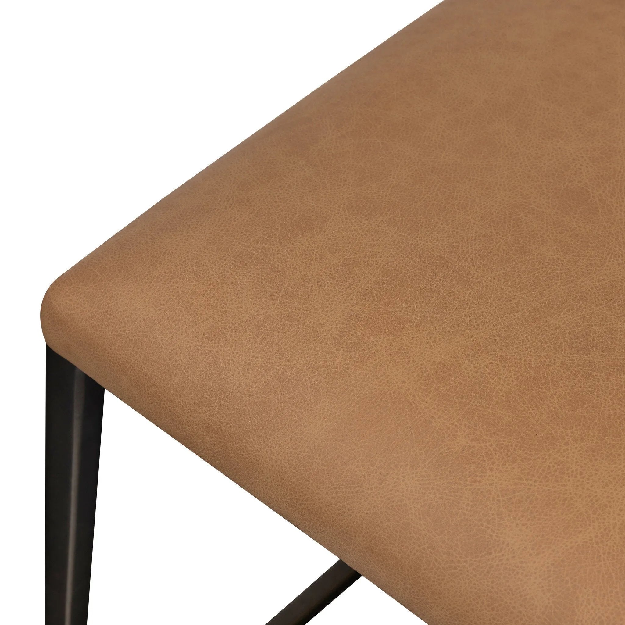 Bring a slim, light look to the dining room. This counter stool pairs camel top-grain leather and bronzed iron to craft a simple, airy look. A tapered leg and decorative handle on the back elevate the look.As fans of organic modern materials at Amethyst, we love the optimistic inspired Somerson Stool - Counter. Amethyst Home provides interior design, new home construction design consulting, vintage area rugs, and lighting in the Nashville metro area.