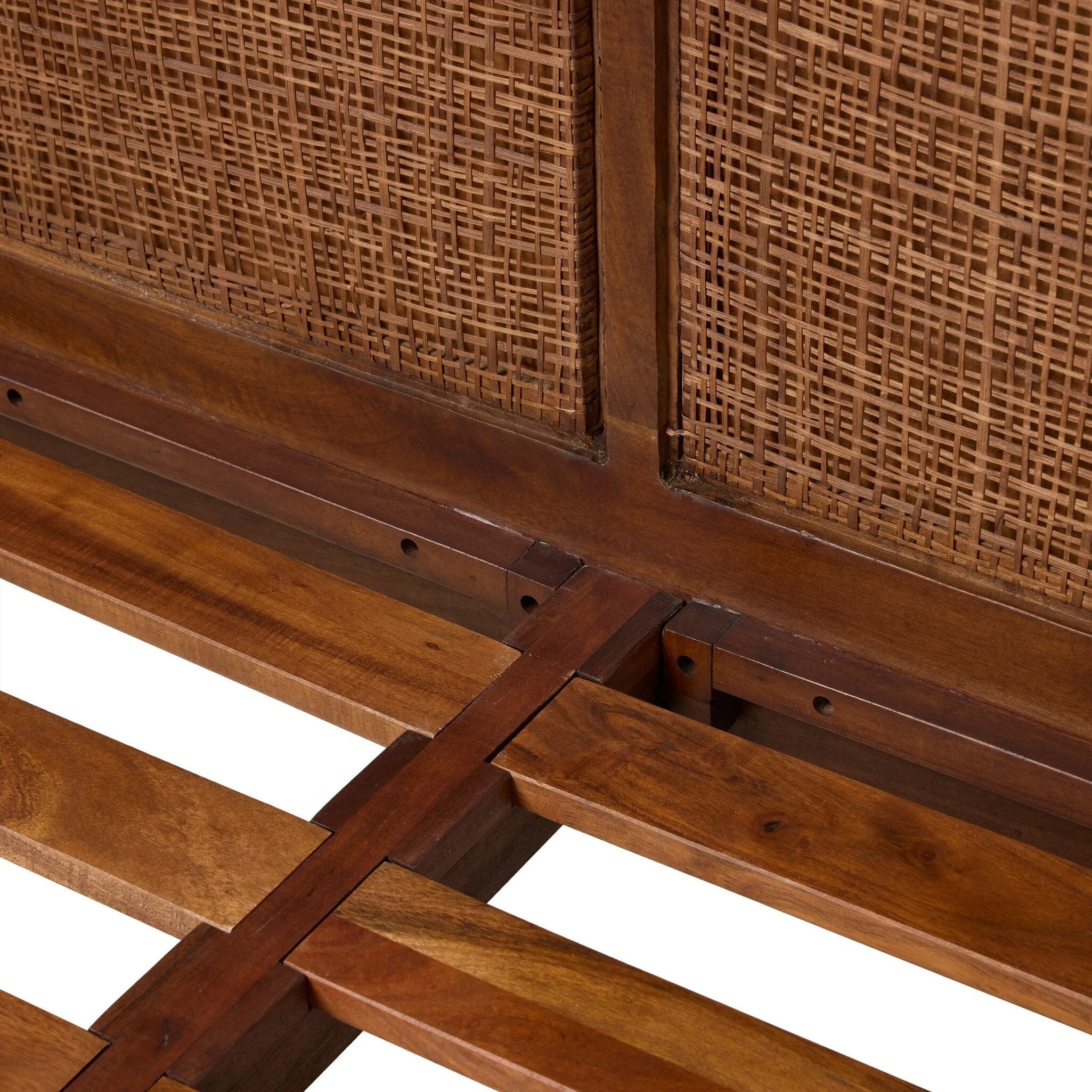 A contemporary take on classic coastal design, this bed features a cocoa cane headboard and footboard framed by solid mango with solid acacia legs and details. Warm midcentury tones contribute to the piece’s timelessness.As lovers of natural materials at Amethyst, we love the nature inspired Sondo Bed. Amethyst Home provides interior design, new home construction design consulting, vintage area rugs, and lighting in the Salt Lake City metro area.