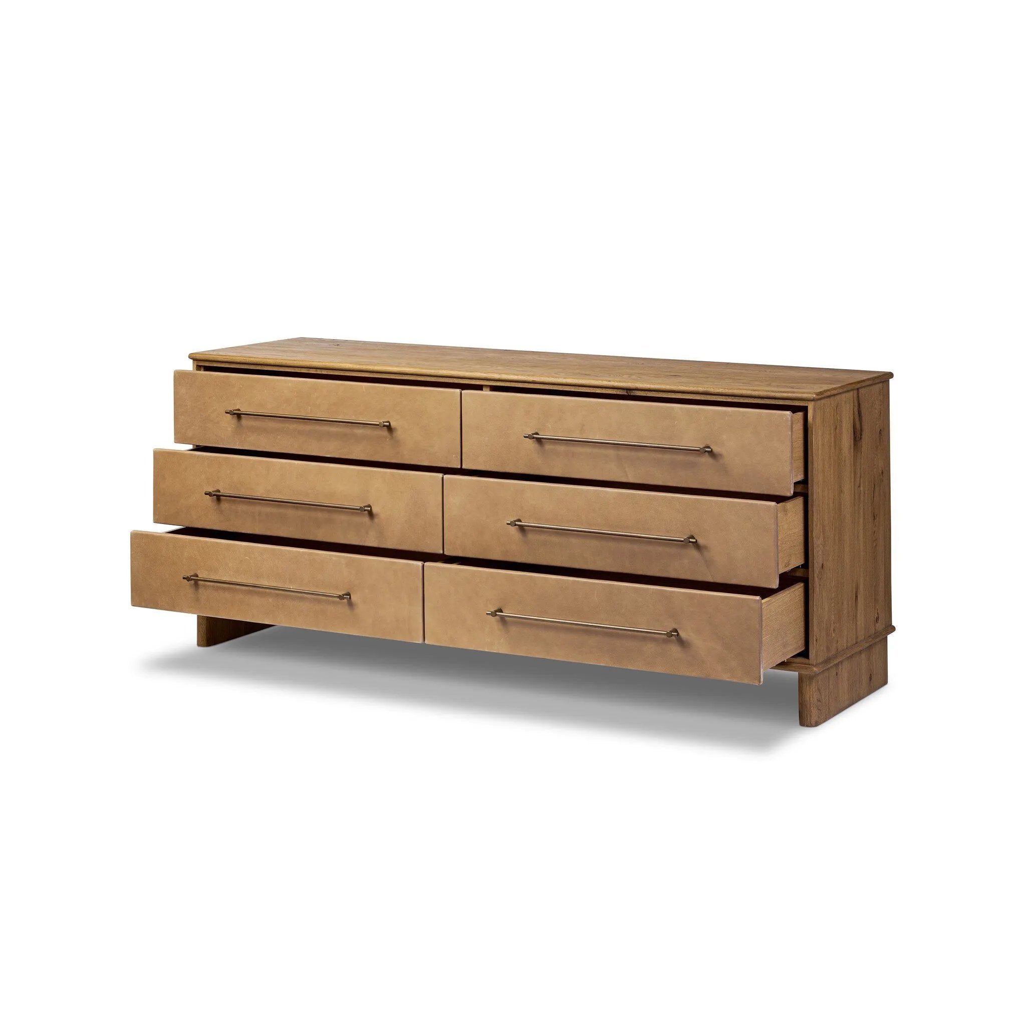 Bring a Nordic, material-driven look to your bedroom with a six-drawer dresser of grain-rich oak and drawer fronts covered with tan top-grain leather. Finished out with long, linear iron hardware Amethyst Home provides interior design, new home construction design consulting, vintage area rugs, and lighting in the Scottsdale metro area.