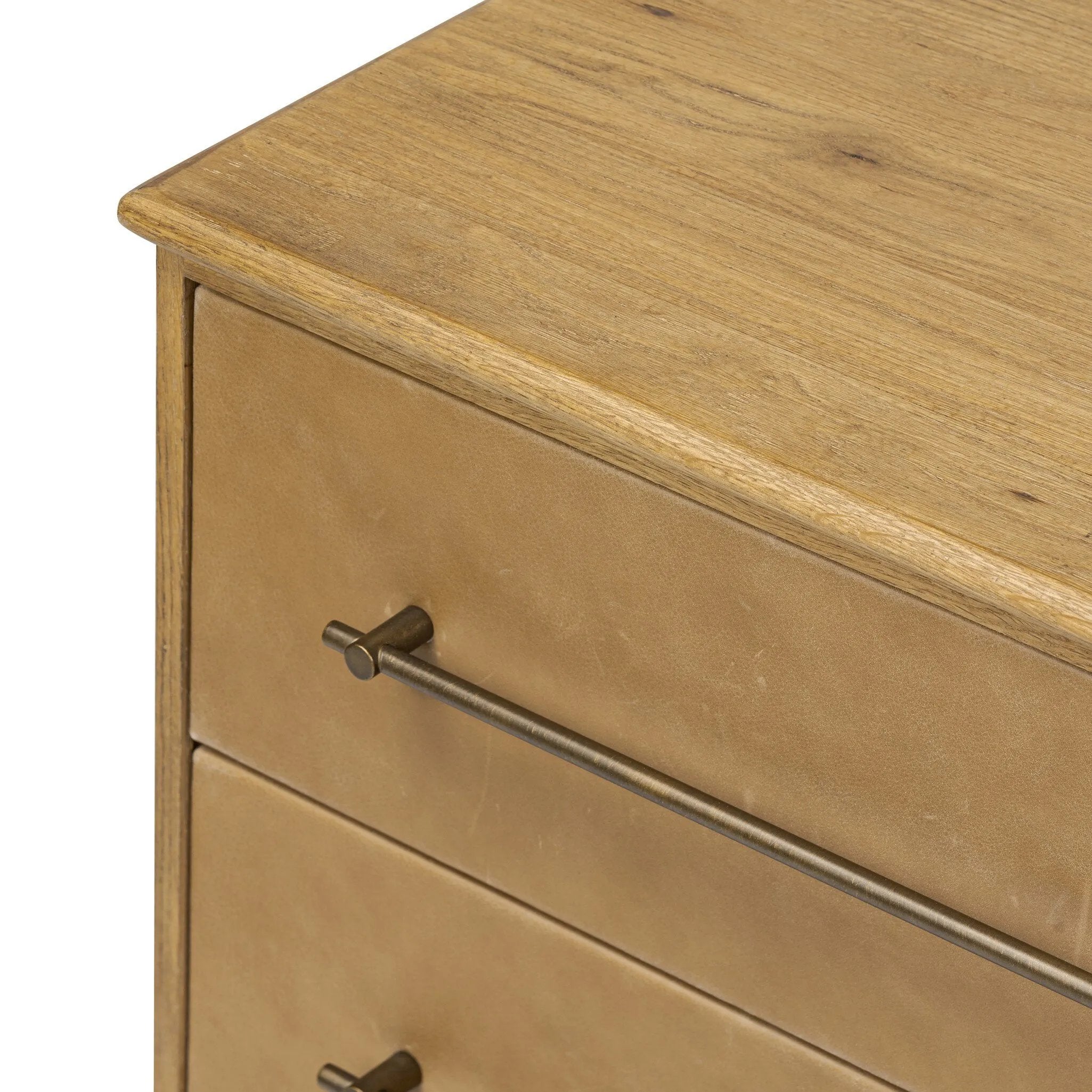 Featuring Stella Hazel Oak Veneer Nightstand by Four Hands at Amethyst Home. Bring a Nordic-inspired look to your bedroom styling. A spacious two-drawer nightstand of thick, grain-rich oak veneer encases drawer fronts covered with tan top-grain leather exclusive to Four Hands. Finished out with long, linear iron hardware. Overall Dimensions: 28.00"w x 19.50. Amethyst Home provides interior design, new home construction design consulting, vintage area rugs, and lighting in the Calabasas metro area.