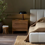 Featuring Stella Hazel Oak Veneer Nightstand by Four Hands at Amethyst Home. Bring a Nordic-inspired look to your bedroom styling. A spacious two-drawer nightstand of thick, grain-rich oak veneer encases drawer fronts covered with tan top-grain leather exclusive to Four Hands. Finished out with long, linear iron hardware. Overall Dimensions: 28.00"w x 19.. Amethyst Home provides interior design, new home construction design consulting, vintage area rugs, and lighting in the Kansas City metro area.