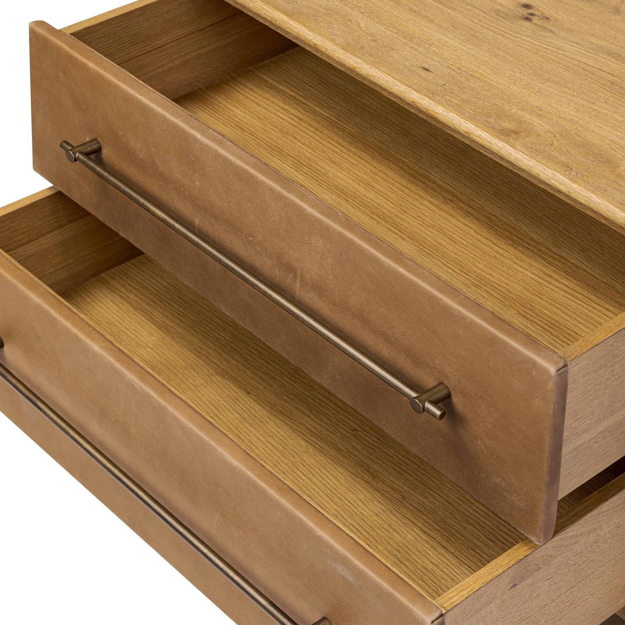 Featuring Stella Hazel Oak Veneer Nightstand by Four Hands at Amethyst Home. Bring a Nordic-inspired look to your bedroom styling. A spacious two-drawer nightstand of thick, grain-rich oak veneer encases drawer fronts covered with tan top-grain leather exclusive to Four Hands. Finished out with long, linear iron hardware. Overall Dimensions: 28.00"w x 19.50. Amethyst Home provides interior design, new home construction design consulting, vintage area rugs, and lighting in the Park City metro area.