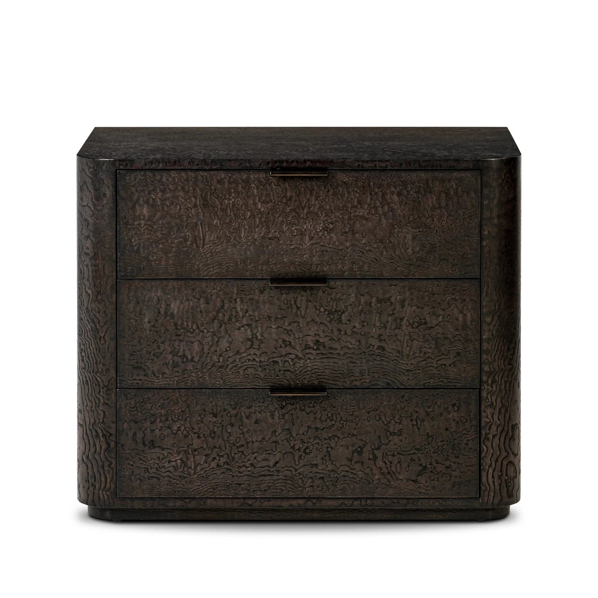 Flush doors, subtle hardware and rounded corners let the burl-like wood veneer of this character-rich nightstand take center stage on an understated pedestal base, with three drawers for max function.As enthusiasts of luxe aesthetics at Amethyst, we love the warm modern inspired Stenson 3 Drawer Nightstand. Amethyst Home provides interior design, new home construction design consulting, vintage area rugs, and lighting in the Boston metro area.