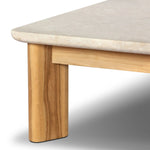 Grade A teak is fine sanded into a soft, unfinished look that highlights the wood's natural grain, finished with rounded legs that angle inward. Topped with neutral travertine stone for a blend of materials. Cover or store inside during inclement weather and when not in use. Amethyst Home provides interior design, new home construction design consulting, vintage area rugs, and lighting in the Austin metro area.
