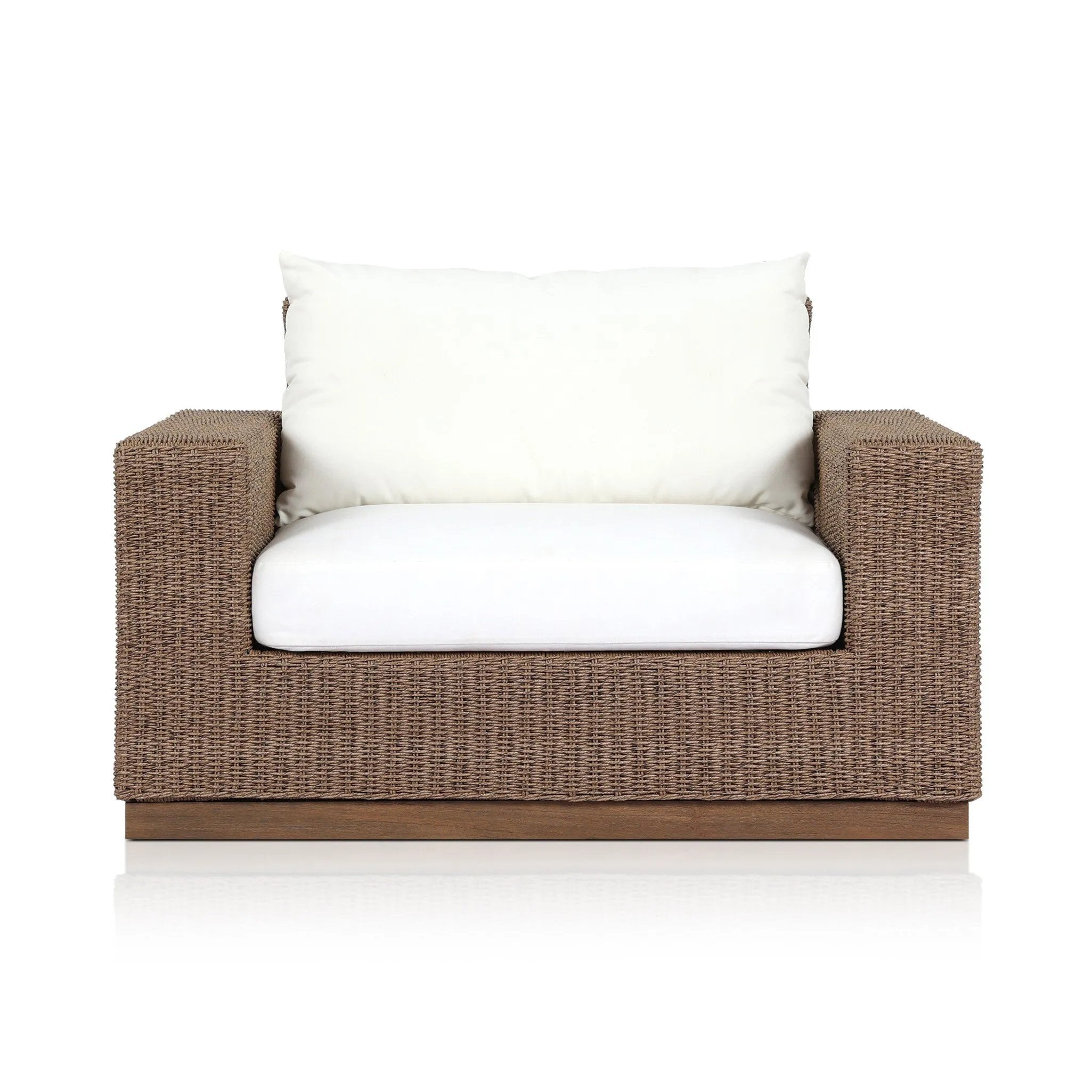 Elevate your outdoors. A wide-format outdoor chair features a faux hyacinth frame and plinth base. Linear details and a boxy silhouette make this piece truly timeless, while a knife-edge back  cushion softens the whole look. Upholstered in 100% olefin, known for its UV-resistant, water-repellent and quick-drying abilities. Amethyst Home provides interior design, new home construction design consulting, vintage area rugs, and lighting in the Winter Garden metro area.