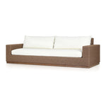 Featuring Suri Arashi Salt Outdoor Sofa 106" by Four Hands at Amethyst Home. Elevate your outdoors. A wide-format outdoor sofa features a faux hyacinth frame and plinth base. Linear details and a boxy silhouette make this piece truly timeless, while knife-edge back cushions soften the whole look. Upholstered in 100% olefin, known for its UV-resistant, wat. Amethyst Home provides interior design, new home construction design consulting, vintage area rugs, and lighting in the Kansas City metro area.