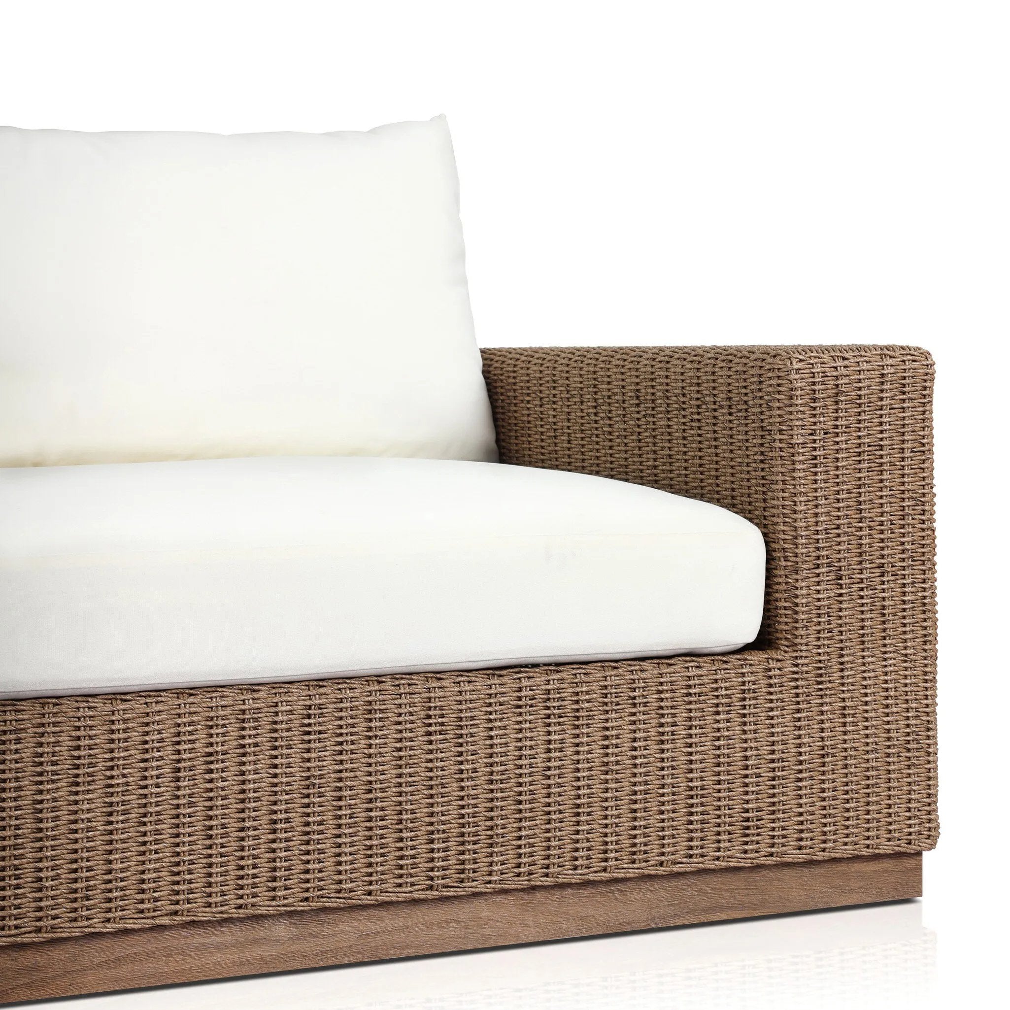 Featuring Suri Arashi Salt Outdoor Sofa 106" by Four Hands at Amethyst Home. Elevate your outdoors. A wide-format outdoor sofa features a faux hyacinth frame and plinth base. Linear details and a boxy silhouette make this piece truly timeless, while knife-edge back cushions soften the whole look. Upholstered in 100% olefin, known for its UV-resistant, water-rep. Amethyst Home provides interior design, new home construction design consulting, vintage area rugs, and lighting in the Omaha metro area.