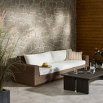 Featuring Suri Arashi Salt Outdoor Sofa 106" by Four Hands at Amethyst Home. Elevate your outdoors. A wide-format outdoor sofa features a faux hyacinth frame and plinth base. Linear details and a boxy silhouette make this piece truly timeless, while knife-edge back cushions soften the whole look. Upholstered in 100% olefin, known for its UV-resistant, wate. Amethyst Home provides interior design, new home construction design consulting, vintage area rugs, and lighting in the Washington metro area.
