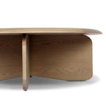 Featuring Surie Sandy Oak Resawn Coffee Table by Four Hands at Amethyst Home. A shape-driven piece inspired by clean Nordic design. Softened edges and a curved base craft a sense of flow, accentuated by cathedral grain oak with beautiful natural warmth. Overall Dimensions: 48.00"w x 48.00"d x 16.50"h. Amethyst Home provides interior design, new home construction design consulting, vintage area rugs, and lighting in the Portland metro area.