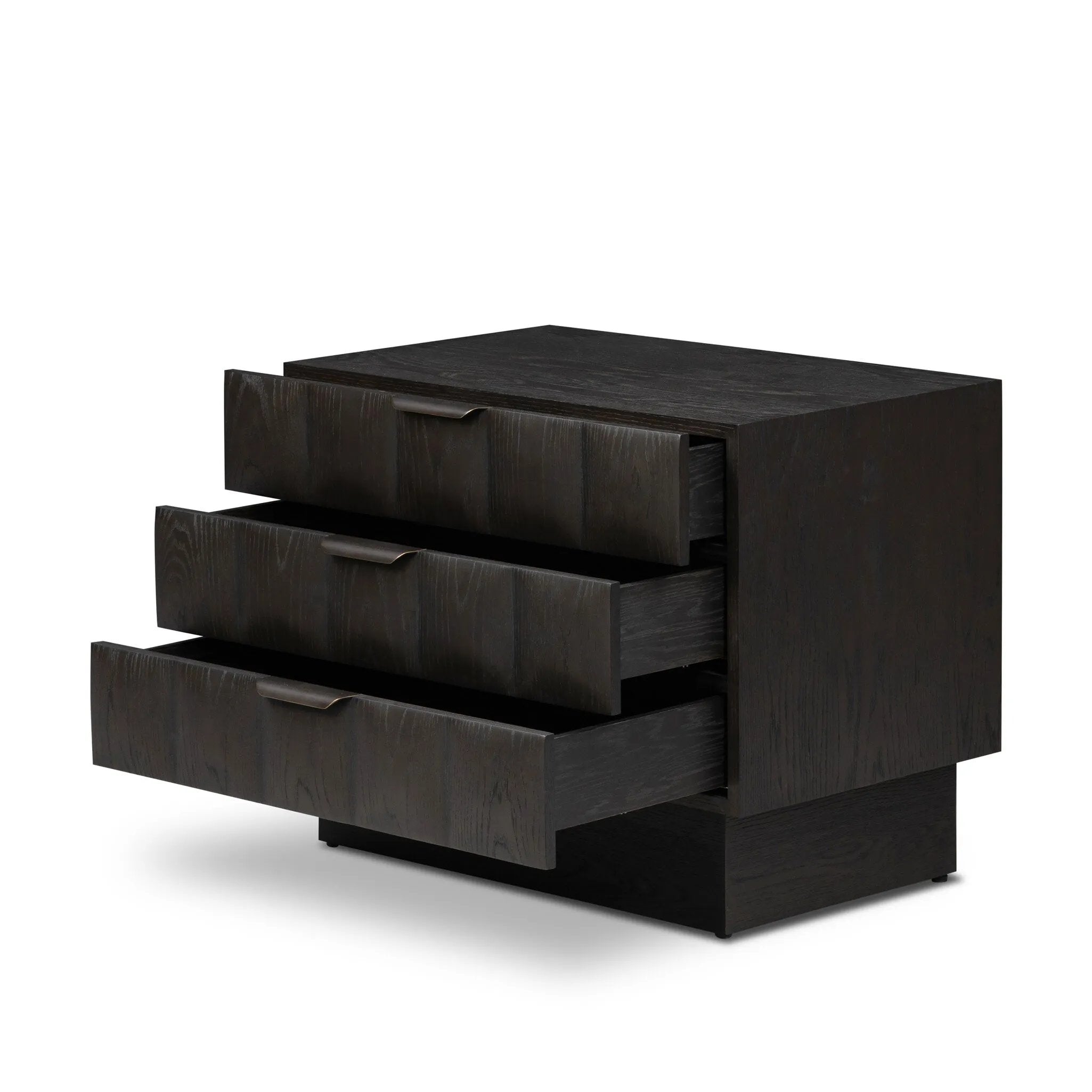 A softened Brutalist take on the traditional nightstand. The monolithic piece’s black oak veneer case sits atop a matching pedestal for an element of exaggeration. A grid pattern with inflated volume adds drama.As enthusiasts of luxe materials at Amethyst, we love the warm modern inspired Swell Nightstand - Dry Black Oak Veneer. Amethyst Home provides interior design, new home construction design consulting, vintage area rugs, and lighting in the Nashville metro area.