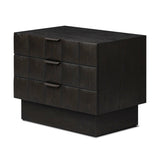 A softened Brutalist take on the traditional nightstand. The monolithic piece’s black oak veneer case sits atop a matching pedestal for an element of exaggeration. A grid pattern with inflated volume adds drama.As enthusiasts of luxe materials at Amethyst, we love the warm modern inspired Swell Nightstand - Dry Black Oak Veneer. Amethyst Home provides interior design, new home construction design consulting, vintage area rugs, and lighting in the Omaha metro area.