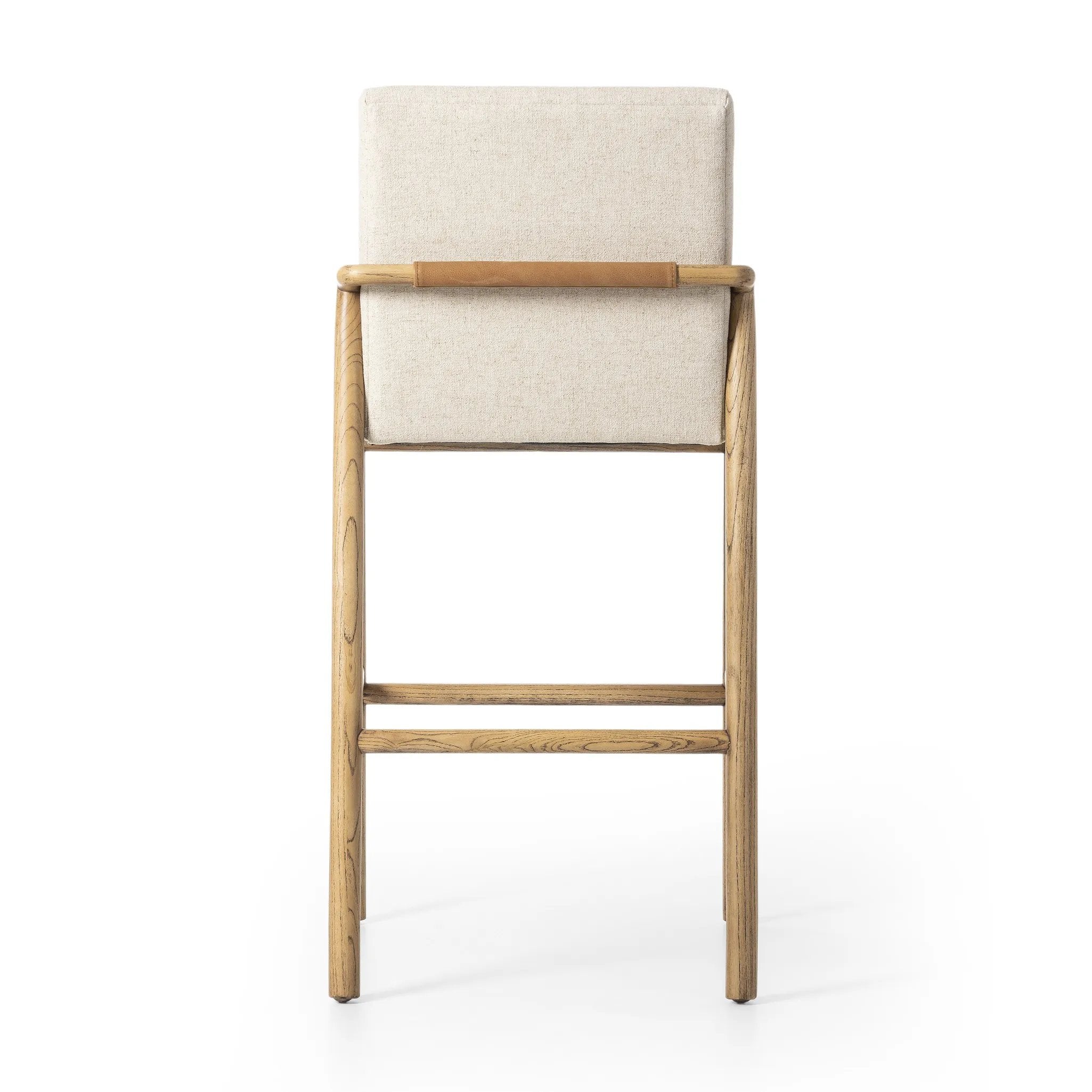Featuring Taki Antwerp Natural Bar + Counter Stool by Four Hands at Amethyst Home. A fluid nettlewood frame cradles a comfortable cushion in a high-performance linen blend. At the back of the chair, a fabric covered handle adds architectural interest to a seamless form. Perfectly sized for the counter. Performance fabrics are specially created to withstand spi. Amethyst Home provides interior design, new home construction design consulting, vintage area rugs, and lighting in the Austin metro area.