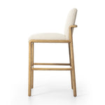 Featuring Taki Antwerp Natural Bar + Counter Stool by Four Hands at Amethyst Home. A fluid nettlewood frame cradles a comfortable cushion in a high-performance linen blend. At the back of the chair, a fabric covered handle adds architectural interest to a seamless form. Perfectly sized for the counter. Performance fabrics are specially created to withstand . Amethyst Home provides interior design, new home construction design consulting, vintage area rugs, and lighting in the Charlotte metro area.