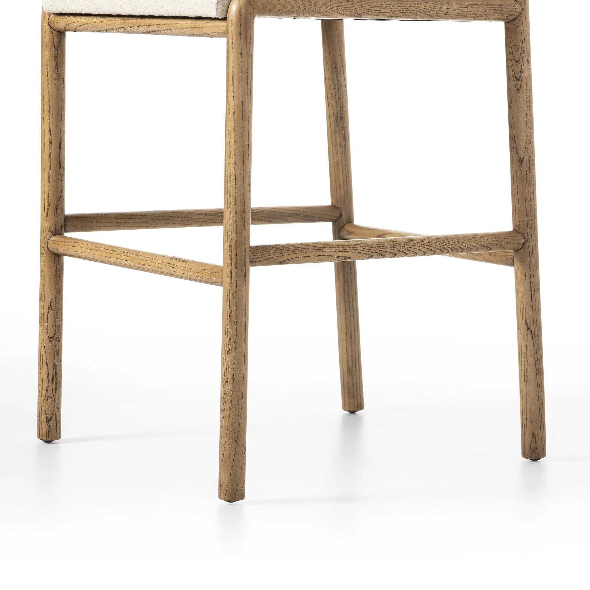 Featuring Taki Antwerp Natural Bar + Counter Stool by Four Hands at Amethyst Home. A fluid nettlewood frame cradles a comfortable cushion in a high-performance linen blend. At the back of the chair, a fabric covered handle adds architectural interest to a seamless form. Perfectly sized for the counter. Performance fabrics are specially created to withstand. Amethyst Home provides interior design, new home construction design consulting, vintage area rugs, and lighting in the Des Moines metro area.
