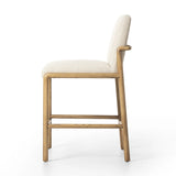 Featuring Taki Antwerp Natural Bar + Counter Stool by Four Hands at Amethyst Home. A fluid nettlewood frame cradles a comfortable cushion in a high-performance linen blend. At the back of the chair, a fabric covered handle adds architectural interest to a seamless form. Perfectly sized for the counter. Performance fabrics are specially created to withstand sp. Amethyst Home provides interior design, new home construction design consulting, vintage area rugs, and lighting in the Houston metro area.