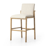 Featuring Taki Antwerp Natural Bar + Counter Stool by Four Hands at Amethyst Home. A fluid nettlewood frame cradles a comfortable cushion in a high-performance linen blend. At the back of the chair, a fabric covered handle adds architectural interest to a seamless form. Perfectly sized for the counter. Performance fabrics are specially created to withstan. Amethyst Home provides interior design, new home construction design consulting, vintage area rugs, and lighting in the Kansas City metro area.