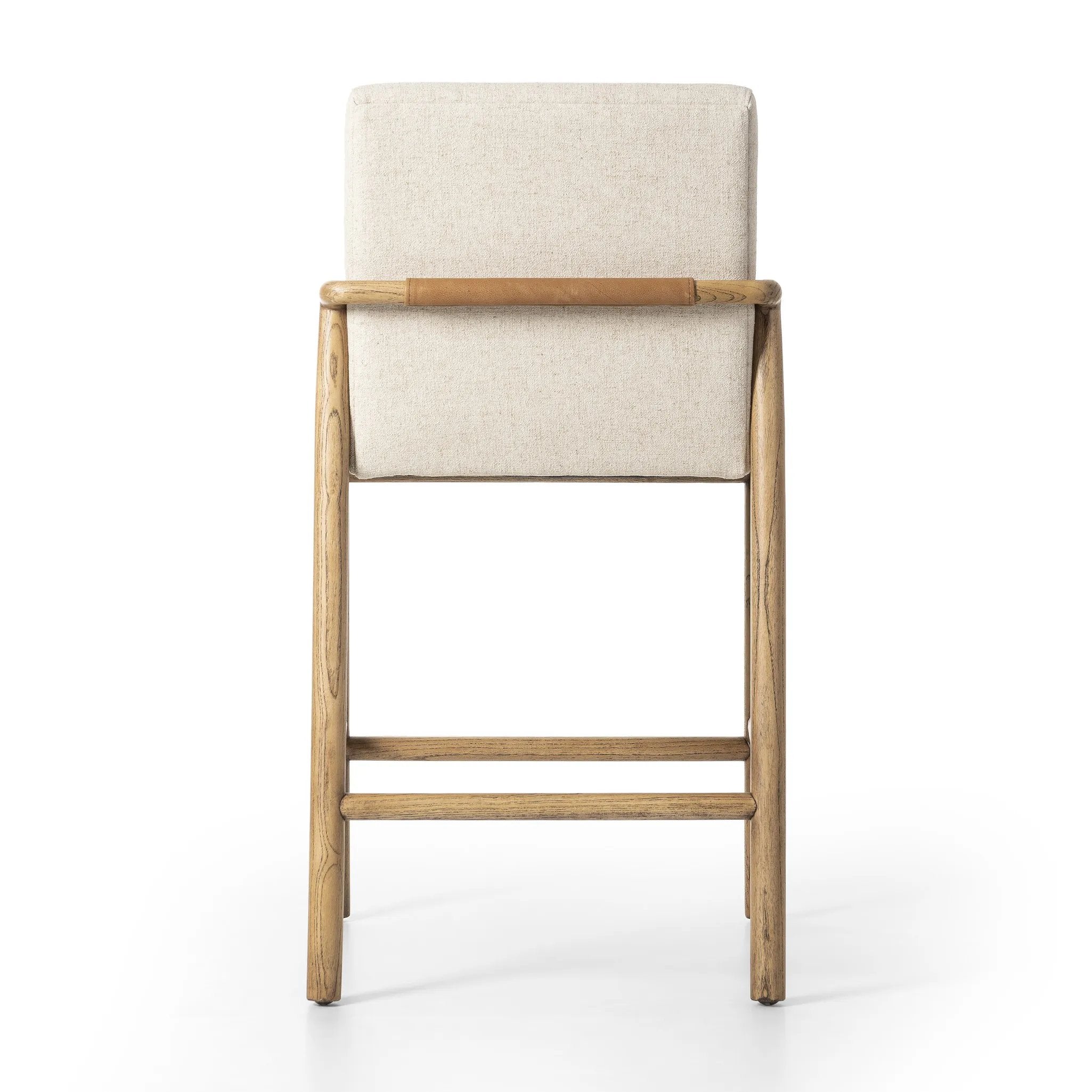 Featuring Taki Antwerp Natural Bar + Counter Stool by Four Hands at Amethyst Home. A fluid nettlewood frame cradles a comfortable cushion in a high-performance linen blend. At the back of the chair, a fabric covered handle adds architectural interest to a seamless form. Perfectly sized for the counter. Performance fabrics are specially created to withstand . Amethyst Home provides interior design, new home construction design consulting, vintage area rugs, and lighting in the Nashville metro area.