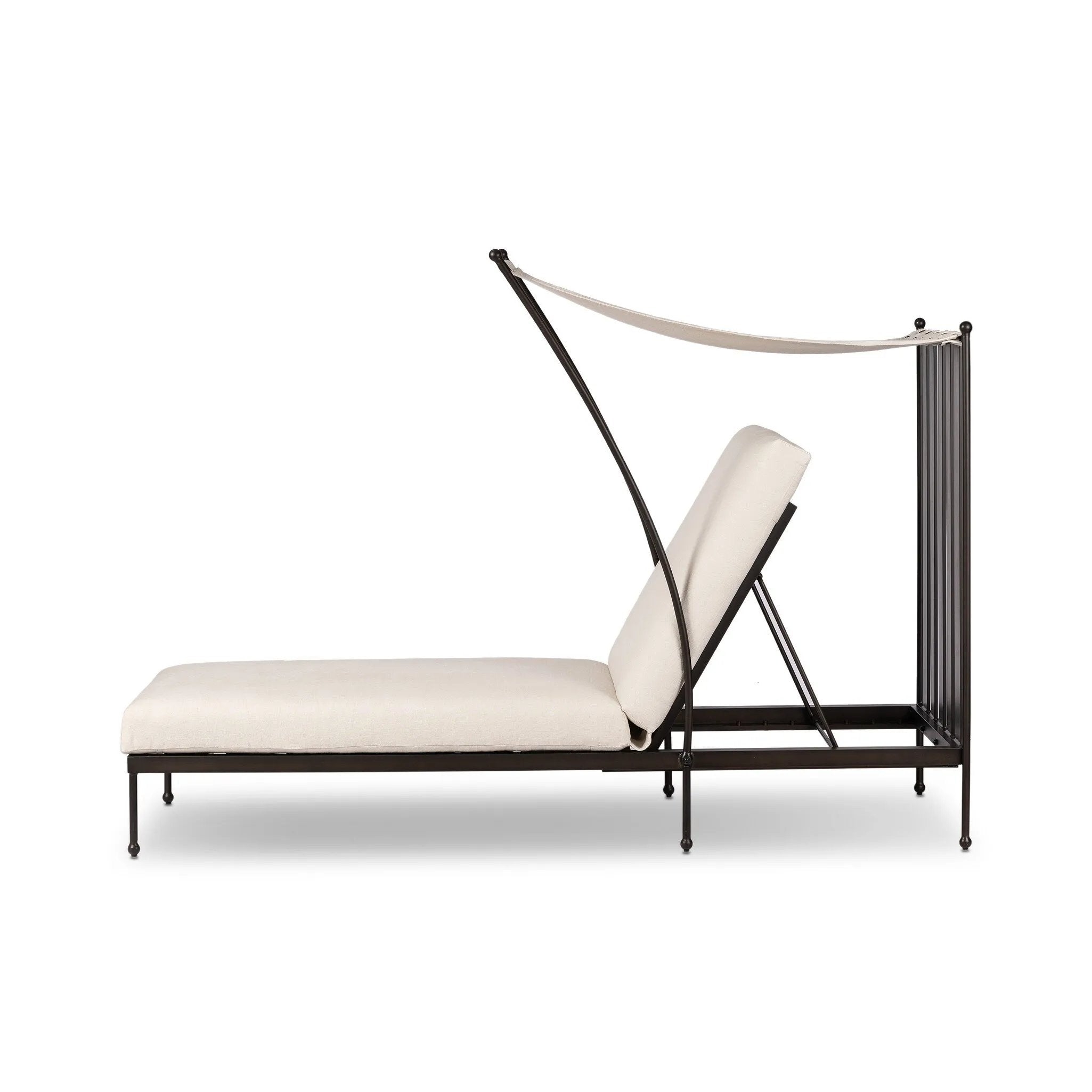 Statement-making comfort. This outdoor chaise brings a modern, French Deco-inspired look with bold color contrast to the patio. High back vertical slats pair with the removable canopy and small finial details for a unique take on traditional. Cover or store indoors during inclement weather and when not in use Amethyst Home provides interior design, new home construction design consulting, vintage area rugs, and lighting in the Seattle metro area.