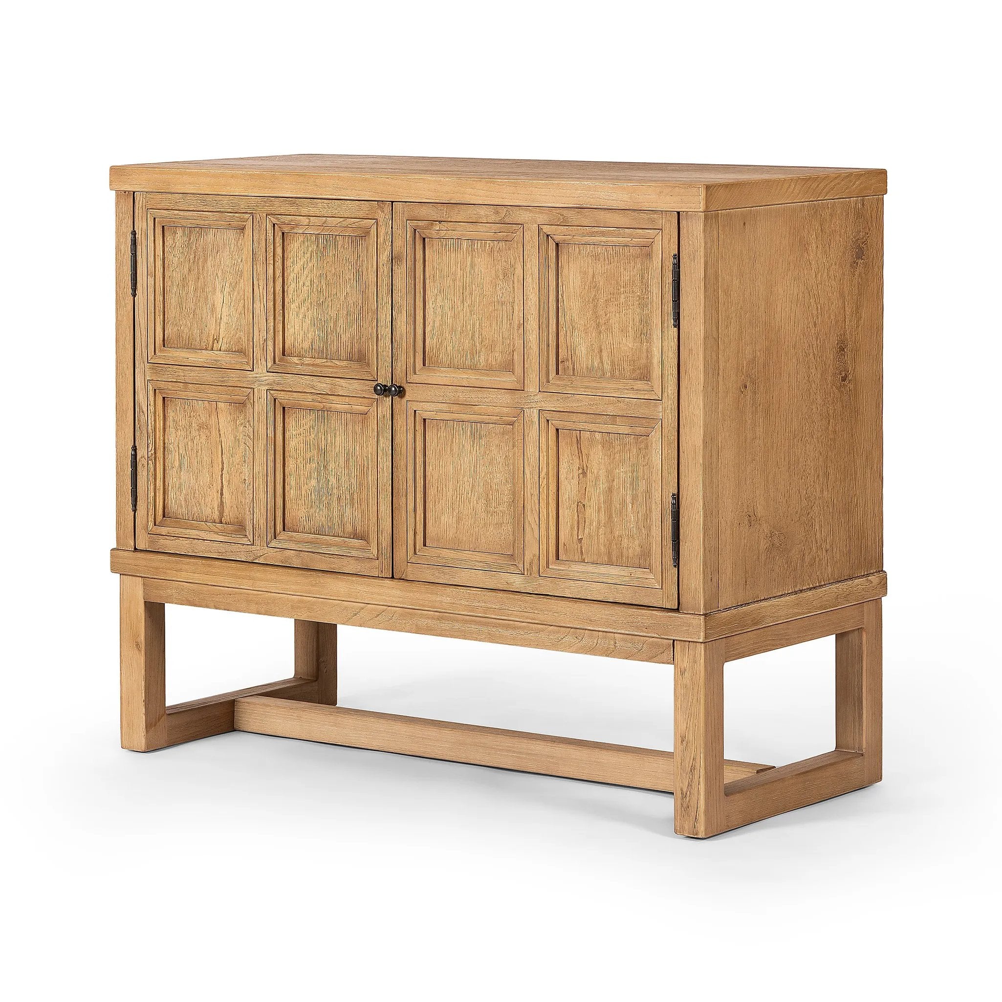 Small-scale cabinetry of worn oak features paneled doors, lending texture to a clean-lined design Amethyst Home provides interior design, new home construction design consulting, vintage area rugs, and lighting in the Dallas metro area.