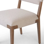 Expertly crafted from natural materials, the Tamari Antwerp Dining Chair is the perfect addition to any dining room. With a sturdy design and comfortable seat, this chair offers both functional and aesthetic appeal. Shipping on 5/16/2024 - order now to elevate your dining experience Amethyst Home provides interior design, new home construction design consulting, vintage area rugs, and lighting in the Newport Beach metro area.