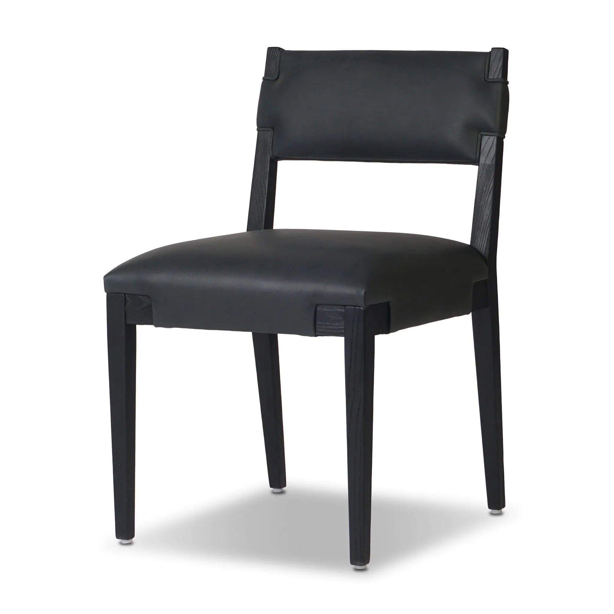 Featuring Tamari Brickhouse Black Dining Chair by Four Hands at Amethyst Home. Indulge in the luxurious experience of dining with our Tamari Brickhouse Black Dining Chair. With its sleek and sophisticated design, this chair is sure to elevate any dining space. Comfortable and elegant, it's the perfect addition to your upscale lifestyle.
Overall Dimensions: . Amethyst Home provides interior design, new home construction design consulting, vintage area rugs, and lighting in the Calabasas metro area.