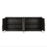Bring a truly unique look to the dining or living space with this stunning sideboard inspired by rolling ocean tides. Crafted of solid mindi and mindi veneer, a stunning front features repetitive, flow-like reeding that's been precision-cut in individual pieces and assembled onto the doors, creating deep curves reminiscent of rippling waves. Amethyst Home provides interior design, new home construction design consulting, vintage area rugs, and lighting in the Austin metro area.