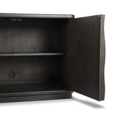 Bring a truly unique look to the dining or living space with this stunning sideboard inspired by rolling ocean tides. Crafted of solid mindi and mindi veneer, a stunning front features repetitive, flow-like reeding that's been precision-cut in individual pieces and assembled onto the doors, creating deep curves reminiscent of rippling waves. Amethyst Home provides interior design, new home construction design consulting, vintage area rugs, and lighting in the Laguna Beach metro area.
