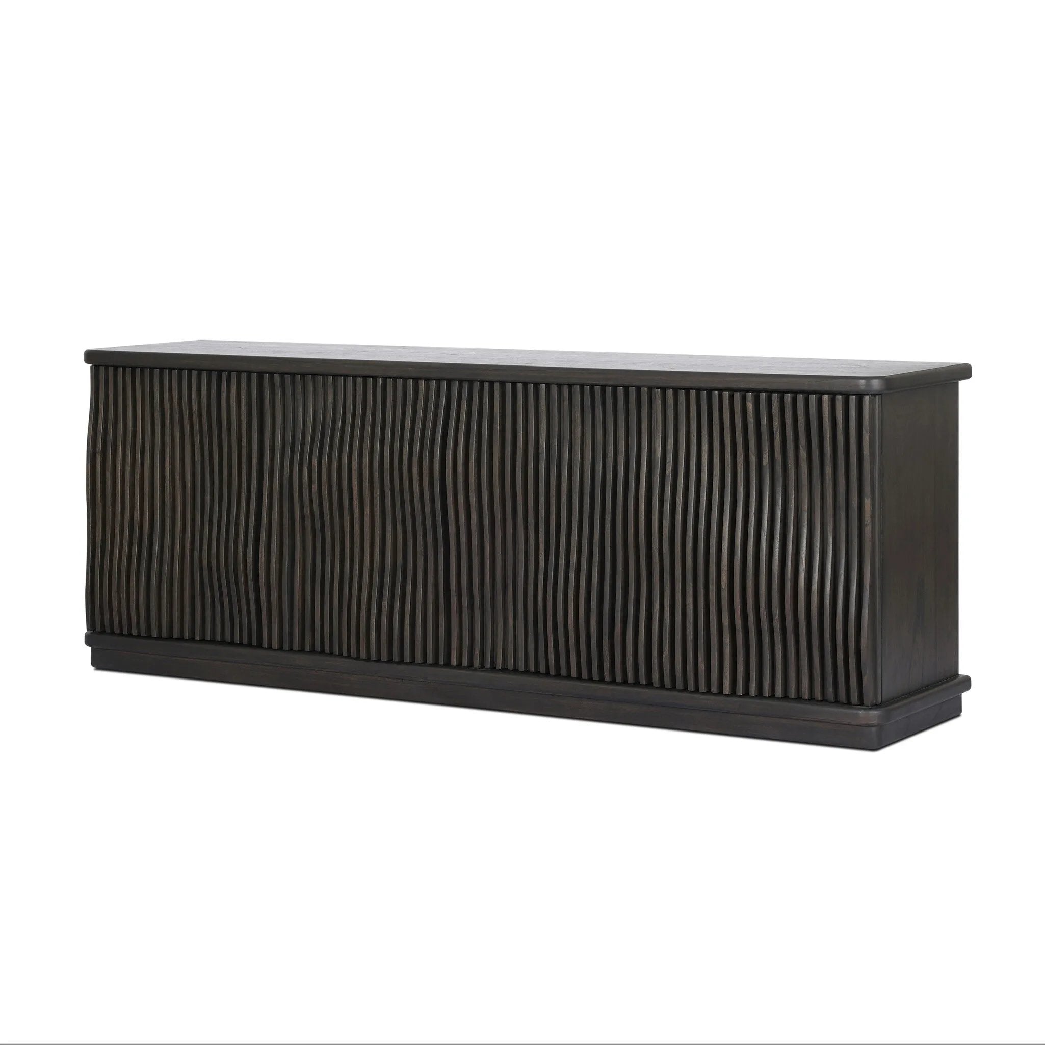 Bring a truly unique look to the dining or living space with this stunning sideboard inspired by rolling ocean tides. Crafted of solid mindi and mindi veneer, a stunning front features repetitive, flow-like reeding that's been precision-cut in individual pieces and assembled onto the doors, creating deep curves reminiscent of rippling waves. Amethyst Home provides interior design, new home construction design consulting, vintage area rugs, and lighting in the Washington metro area.
