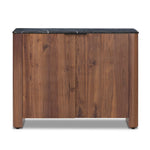 Design your space with hallmark features inspired by soft Brutalism. Made from solid walnut and poplar woods with a natural finish, the cabinet is topped with a black marble top with half bullnose edging for smooth contours. Double doors open to two shelves for ample storage. High-quality hardware is crafted from black iron. Amethyst Home provides interior design, new home construction design consulting, vintage area rugs, and lighting in the Kansas City metro area.