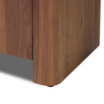 Design your space with hallmark features inspired by soft Brutalism. Made from solid walnut and poplar woods with a natural finish, the cabinet is topped with a black marble top with half bullnose edging for smooth contours. Double doors open to two shelves for ample storage. High-quality hardware is crafted from black iron. Amethyst Home provides interior design, new home construction design consulting, vintage area rugs, and lighting in the San Diego metro area.