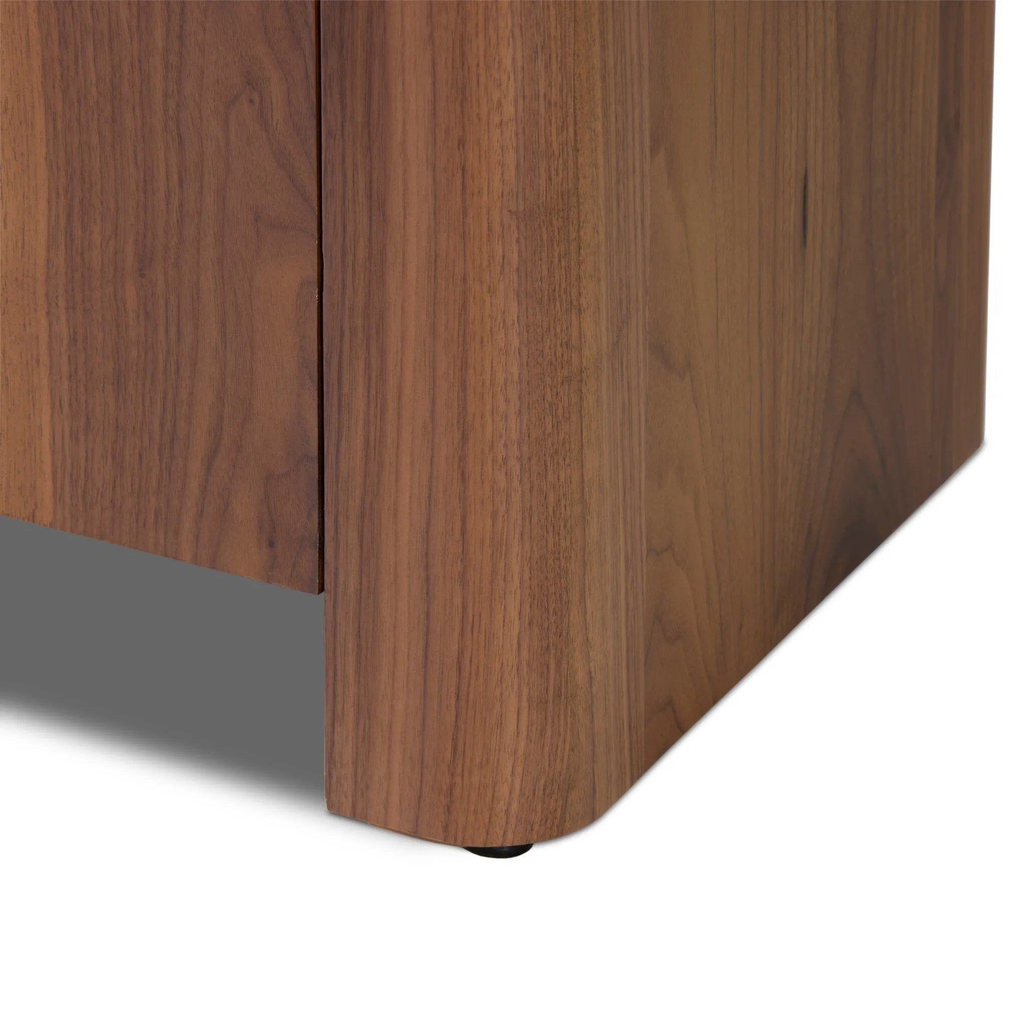 Design your space with hallmark features inspired by soft Brutalism. Made from solid walnut and poplar woods with a natural finish, the cabinet is topped with a black marble top with half bullnose edging for smooth contours. Double doors open to two shelves for ample storage. High-quality hardware is crafted from black iron. Amethyst Home provides interior design, new home construction design consulting, vintage area rugs, and lighting in the San Diego metro area.