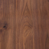 Design your space with hallmark features inspired by soft Brutalism. Made from solid walnut and poplar woods with a natural finish, the cabinet is topped with a black marble top with half bullnose edging for smooth contours. Double doors open to two shelves for ample storage. High-quality hardware is crafted from black iron. Amethyst Home provides interior design, new home construction design consulting, vintage area rugs, and lighting in the Scottsdale metro area.