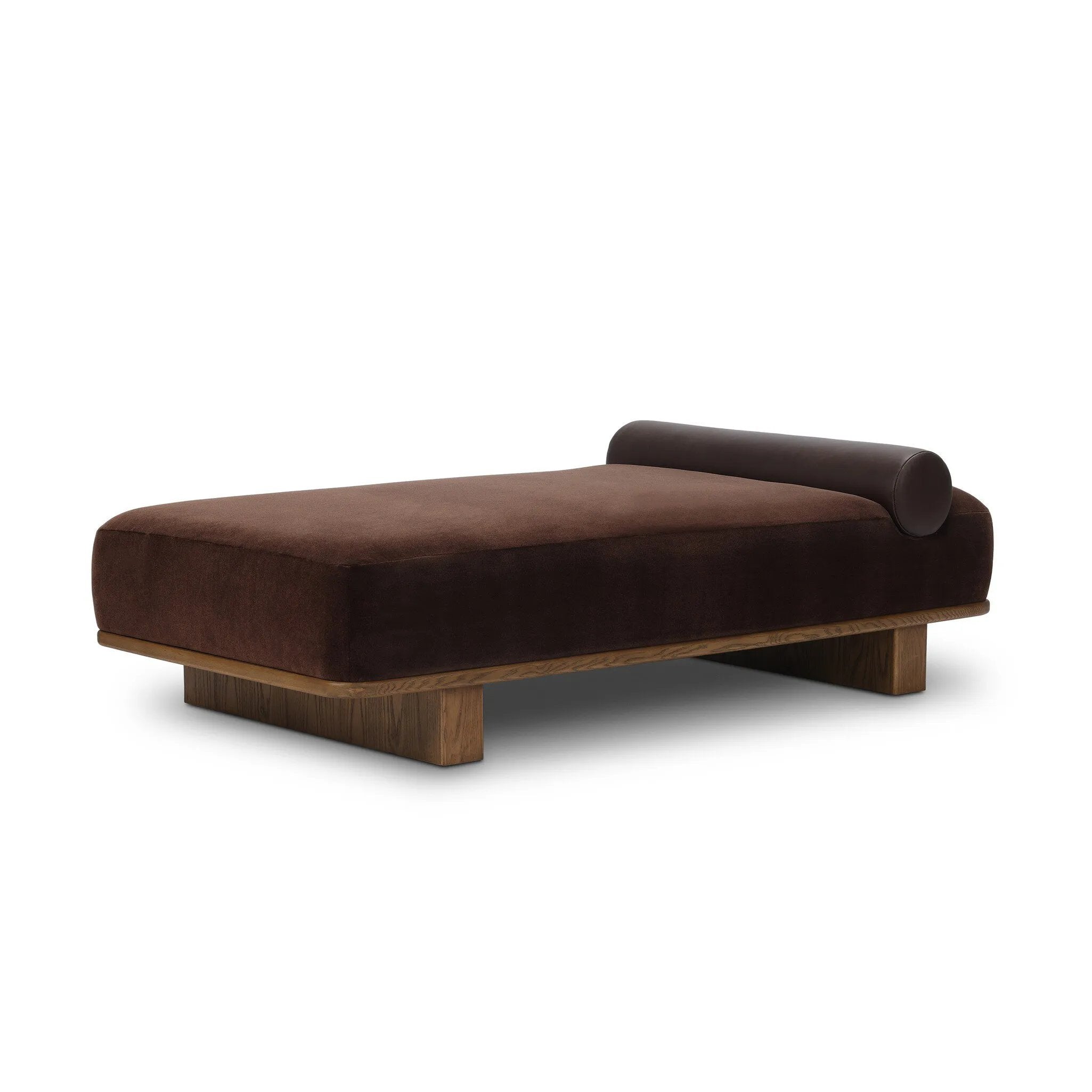 Taking inspiration from vintage Swedish textiles, this chaise serves double duty as an inviting seat and a one-of-a-kind conversation starter. It's a play of geometry and pattern, from the sturdy ash frame with wide ski legs and bold silhouette to the rich mix of upholstery and cut-in bolster cushion. Amethyst Home provides interior design, new home construction design consulting, vintage area rugs, and lighting in the Charlotte metro area.
