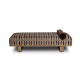 Taking inspiration from vintage Swedish textiles, this chaise serves double duty as an inviting seat and a one-of-a-kind conversation starter. It's a play of geometry and texture, from the sturdy wood frame and bold silhouette to the rich mix of upholstery and cut-in bolster cushion. Amethyst Home provides interior design, new home construction design consulting, vintage area rugs, and lighting in the Laguna Beach metro area.