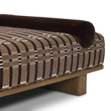 Taking inspiration from vintage Swedish textiles, this chaise serves double duty as an inviting seat and a one-of-a-kind conversation starter. It's a play of geometry and texture, from the sturdy wood frame and bold silhouette to the rich mix of upholstery and cut-in bolster cushion. Amethyst Home provides interior design, new home construction design consulting, vintage area rugs, and lighting in the Park City metro area.