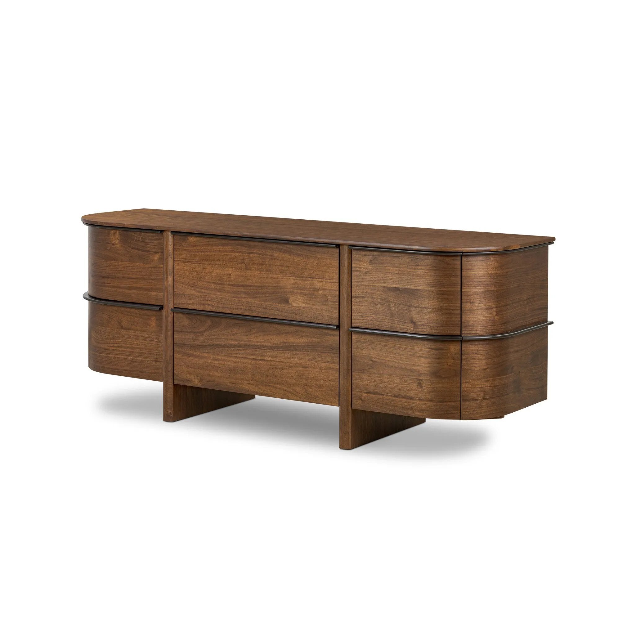 Dark brown walnut is aesthetically shaped with fluid, rounded corners on a ski leg base. The seamless design features six spacious drawers with metal bar hardware that runs along the tops of the drawers Amethyst Home provides interior design, new home construction design consulting, vintage area rugs, and lighting in the Portland metro area.