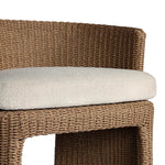 This outdoor dining chair takes on a curved silhouette, crafted from woven faux hyacinth and complemented by a heavily textured boucle cushion. Cover or store inside during inclement weather and when not in use.As lovers of natural materials at Amethyst, we love the designer inspired Thora Outdoor Dining Chair - Vada Cream. Amethyst Home provides interior design, new home construction design consulting, vintage area rugs, and lighting in the Monterey metro area.
