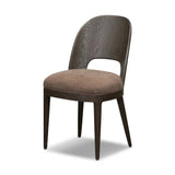 A rounded frame, bent leg profile reflect the midcentury inspiration behind this mixed material dining chair. Framed by parawood with solid oak legs finished in a classic black.As enthusiasts of modern style at Amethyst, we love the warm modern inspired Thorton Dining Chair - Laughlin Cafe. Amethyst Home provides interior design, new home construction design consulting, vintage area rugs, and lighting in the Alpharetta metro area.