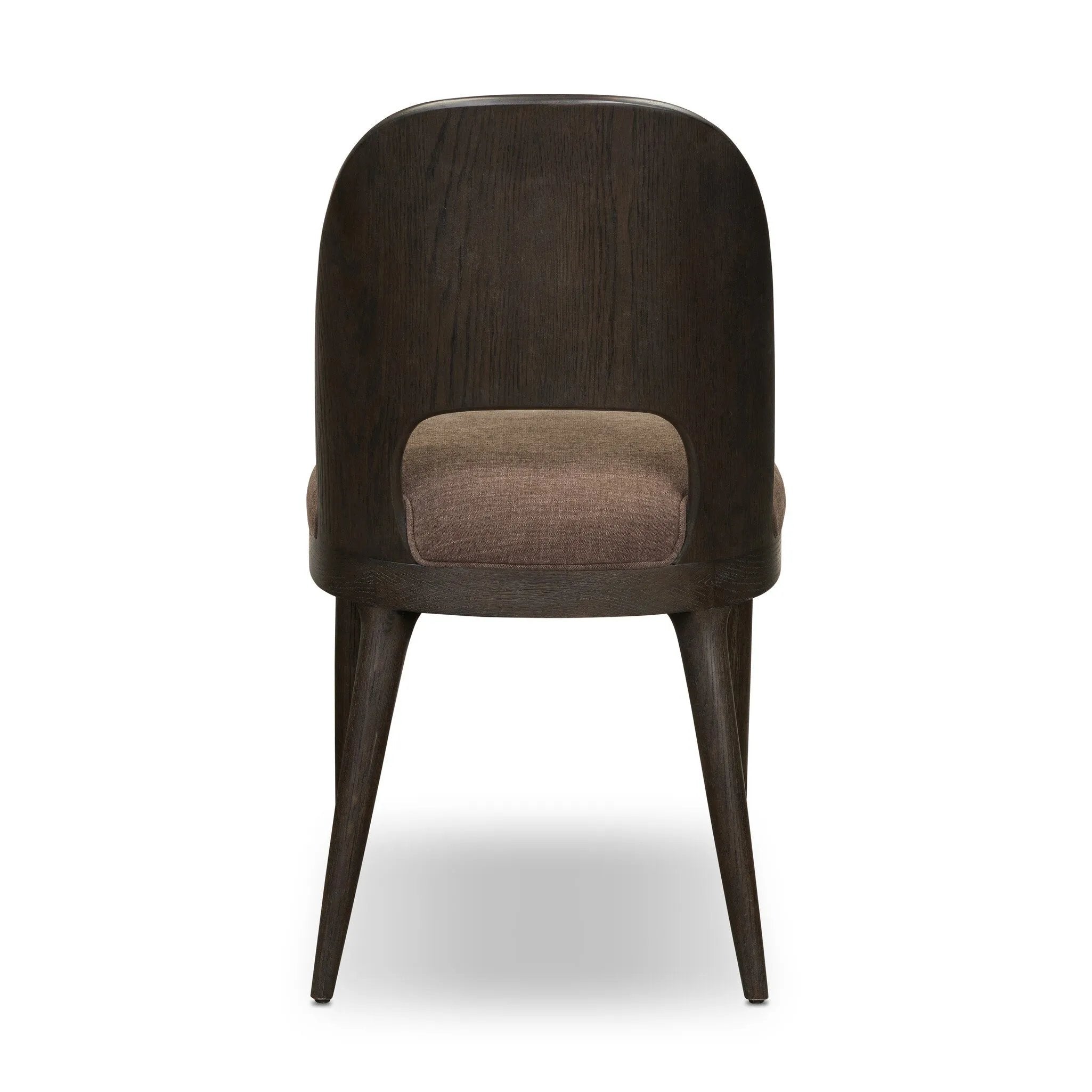 A rounded frame, bent leg profile reflect the midcentury inspiration behind this mixed material dining chair. Framed by parawood with solid oak legs finished in a classic black.As enthusiasts of modern style at Amethyst, we love the warm modern inspired Thorton Dining Chair - Laughlin Cafe. Amethyst Home provides interior design, new home construction design consulting, vintage area rugs, and lighting in the Boston metro area.