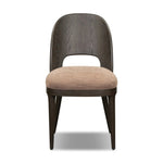 A rounded frame, bent leg profile reflect the midcentury inspiration behind this mixed material dining chair. Framed by parawood with solid oak legs finished in a classic black.As enthusiasts of modern style at Amethyst, we love the warm modern inspired Thorton Dining Chair - Laughlin Cafe. Amethyst Home provides interior design, new home construction design consulting, vintage area rugs, and lighting in the Houston metro area.